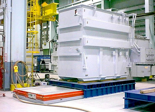 Huge transformers moved on air. Air casters provide a thin film of air under load for moving transformers on air.